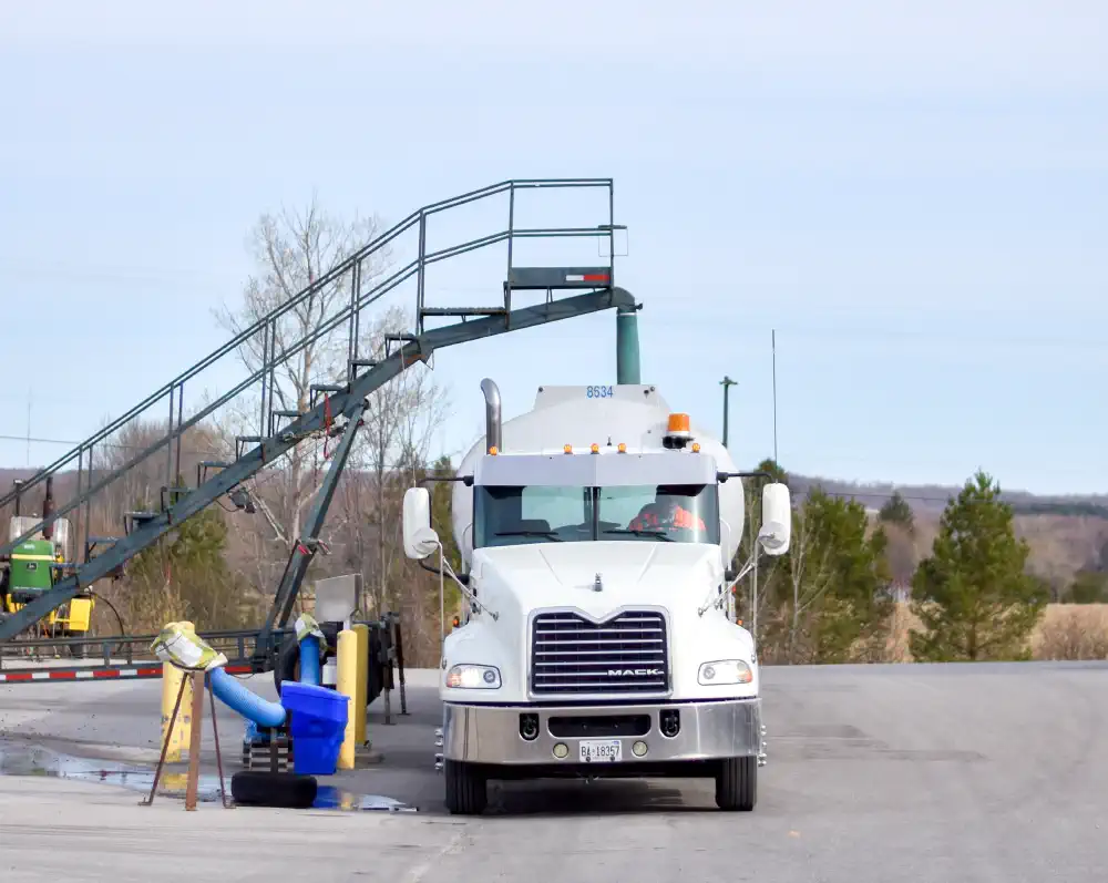Truck loading under overhead loading pipe